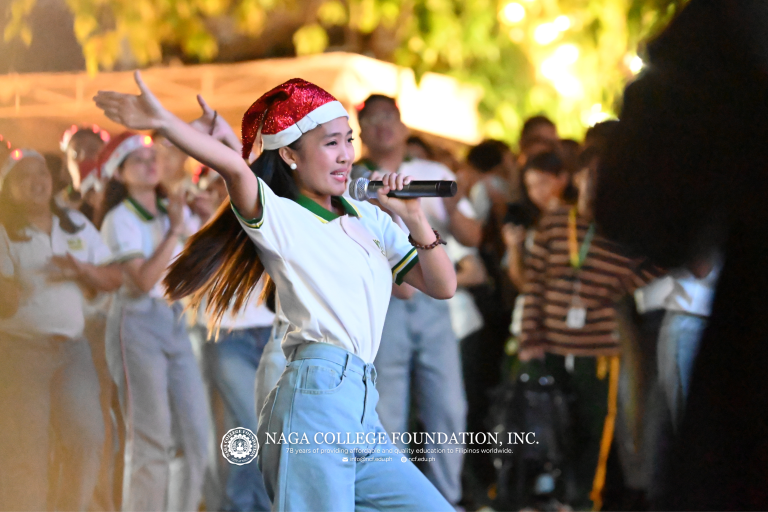 An NCF Chorale member performing the "Paskong Future-Ready"—the NCF 2025 Christmas ID