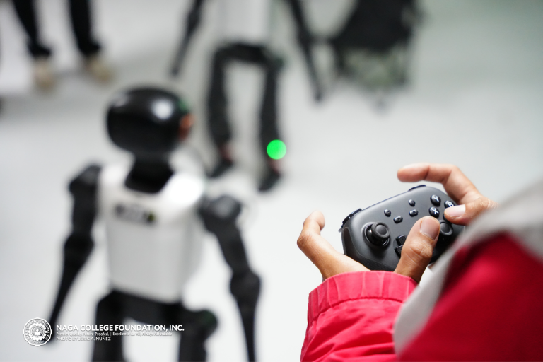 A faculty member simulating the Tigers Humanoid Robots
